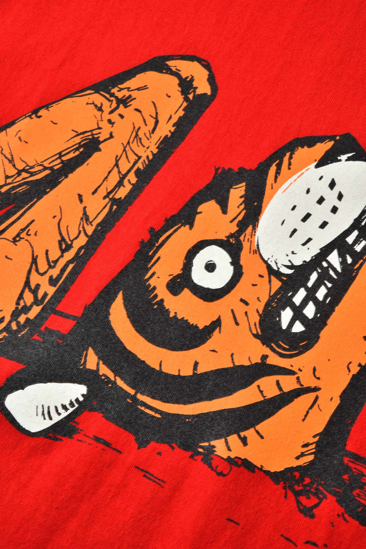 Cartoonish tiger face with a red background