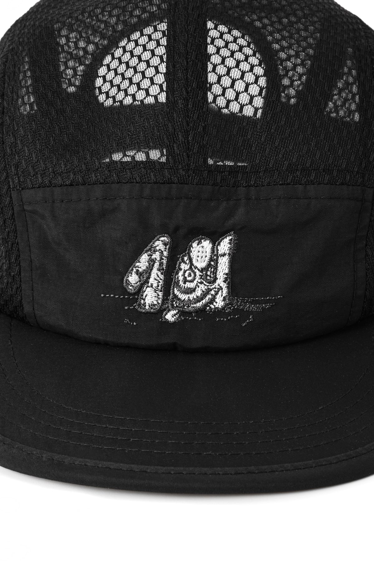 Black cap with mesh back and embroidered logo on a white background