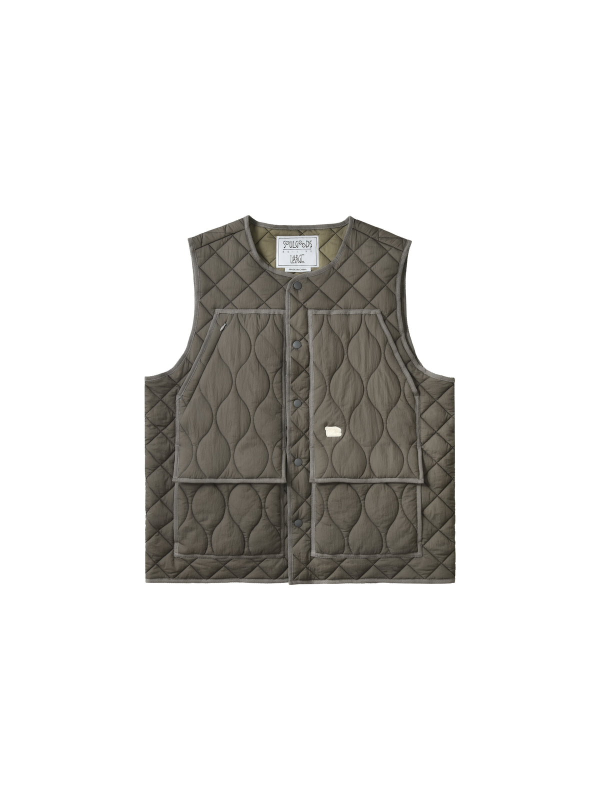 Quilted vest with a brand label on a white background