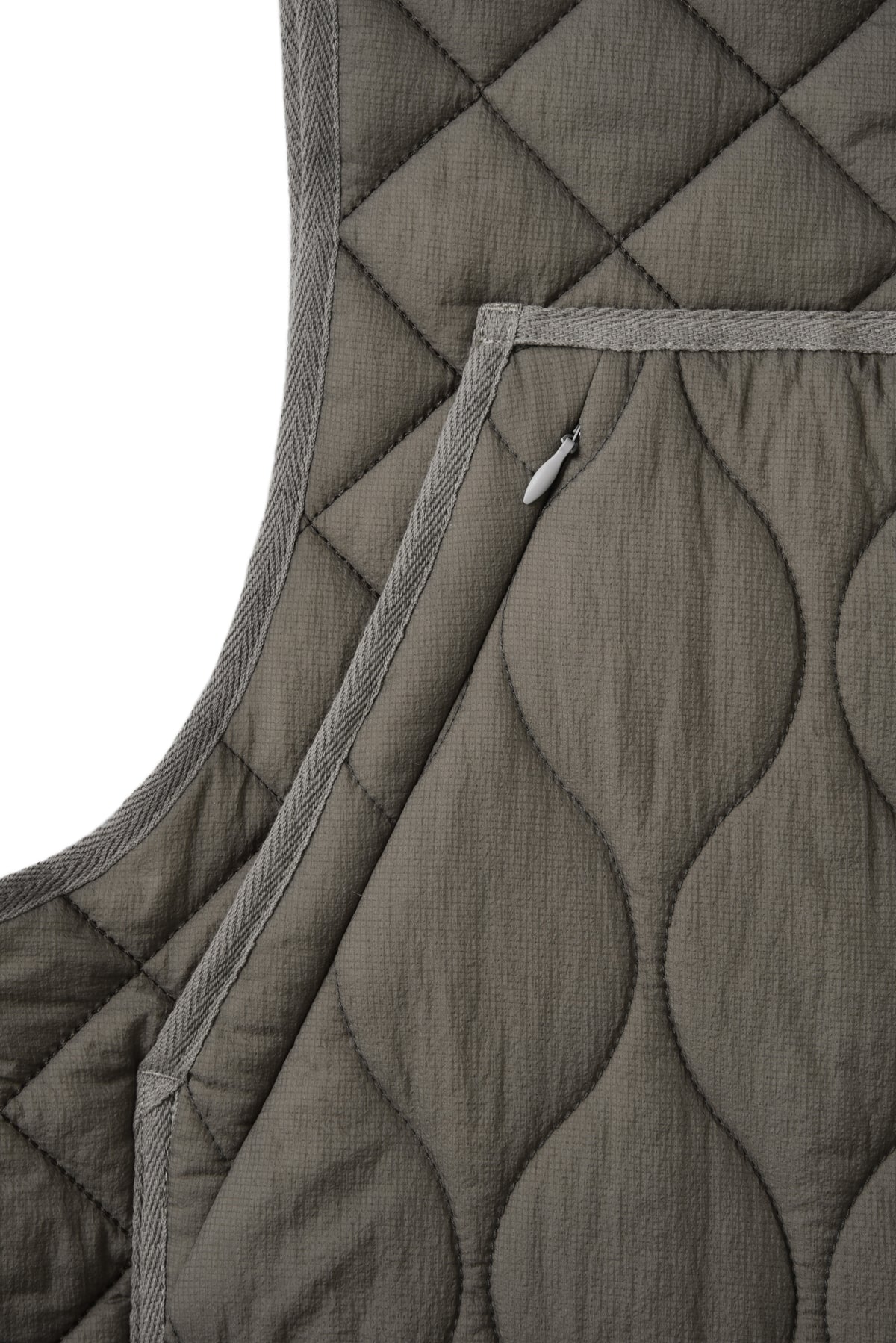 Quilted fabric with geometric pattern on a white background