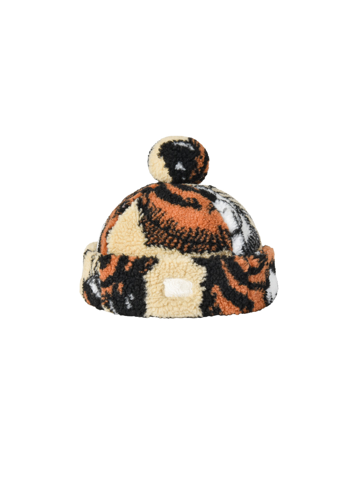 Patterned beanie with pom-pom on a white background