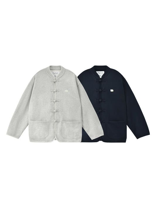 Two jackets, one gray and one navy, on a white background