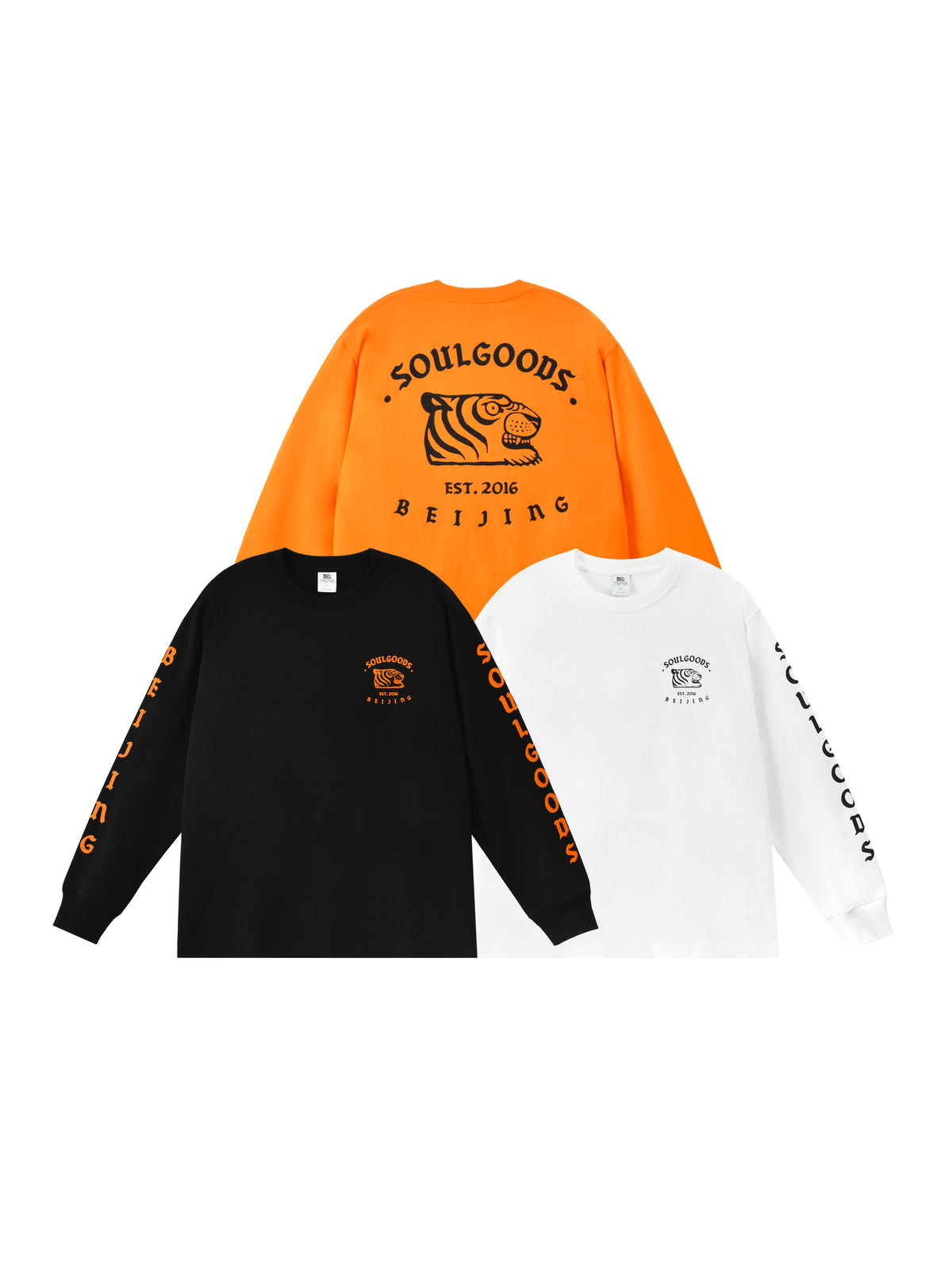 Three long-sleeve shirts in orange, black, and white with 'Soulgoods' branding on a white background.