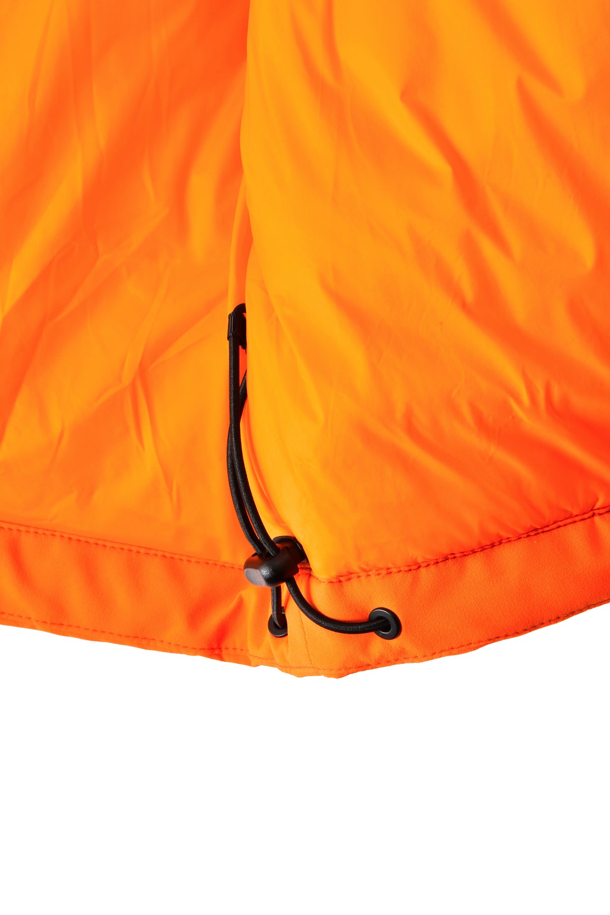 Close-up of an orange jacket with a drawstring on a white background