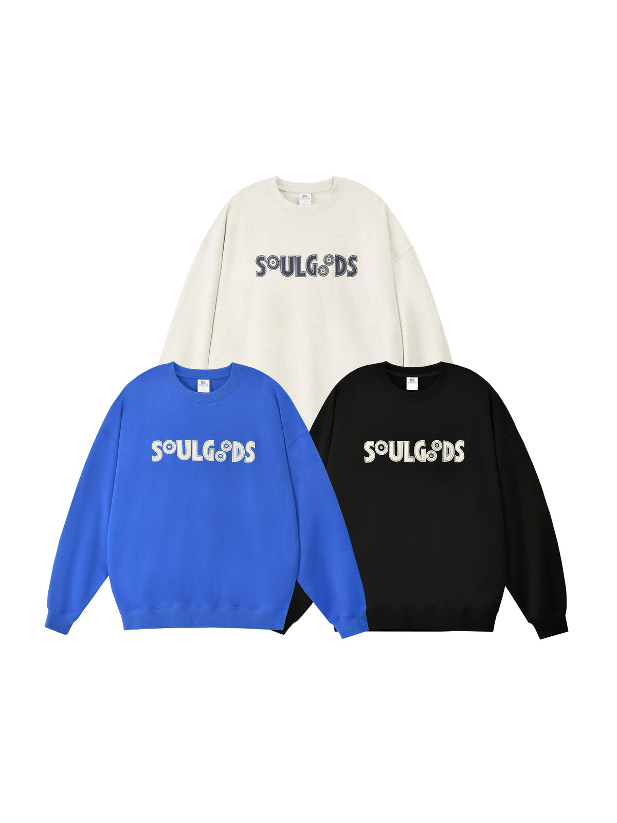 Three sweatshirts in white, blue, and black with 'SOULGOODS' branding on a white background.