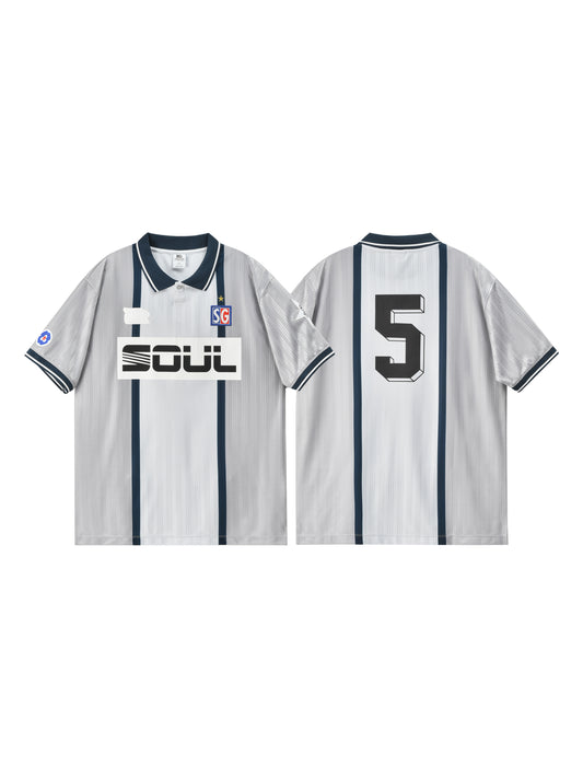 White sports jersey with black accents and branding on a white background