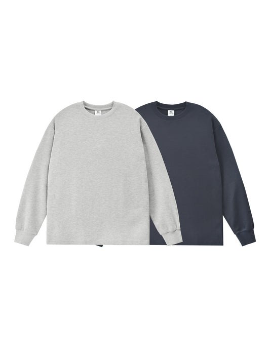 Two sweatshirts, one gray and one navy, on a white background