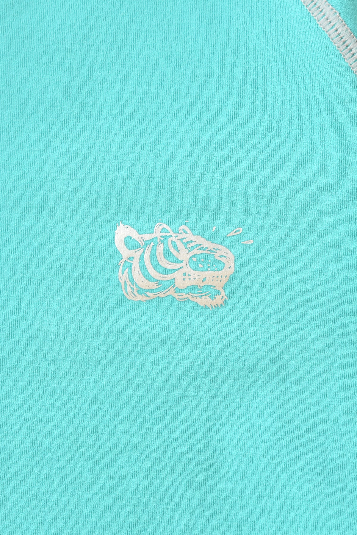 Light blue fabric with a white SOULGOODS tiger head embroidered design on a turquoise background