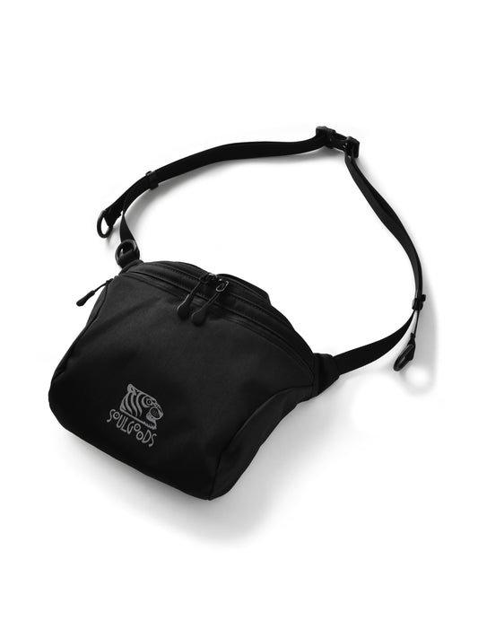 A black nylon fanny pack with an adjustable shoulder strap and a white embroidered tiger logo and 'SOULGOODS' text on the front, shown on a white background.