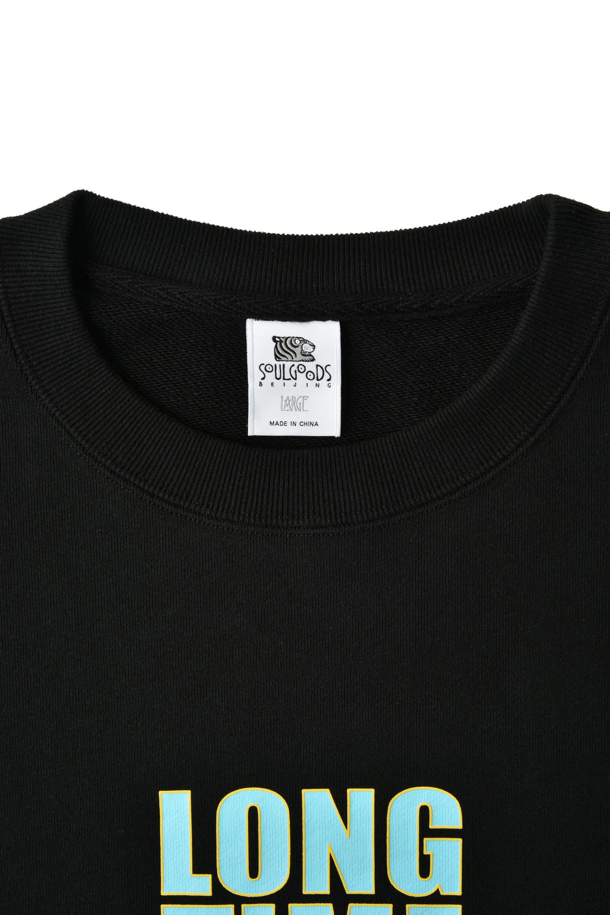 Black sweatshirt with 'LONG' printed on it, featuring a SOULGOODS brand label.