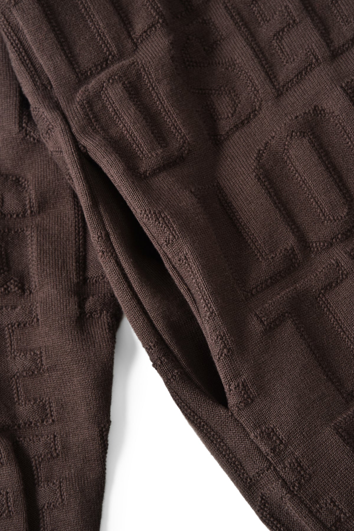 Brown textured fabric on a white background