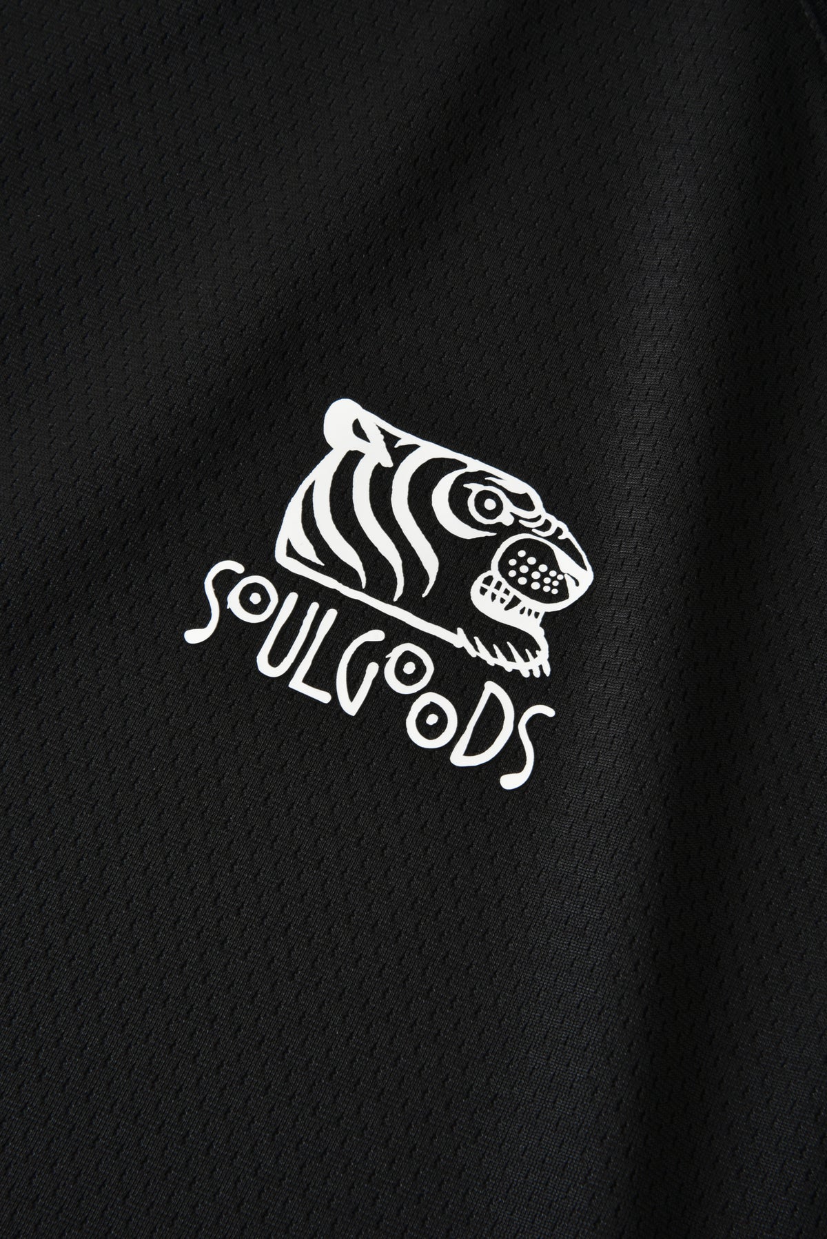 Black jacket with white tiger logo and 'soulgoods' text on a black background
