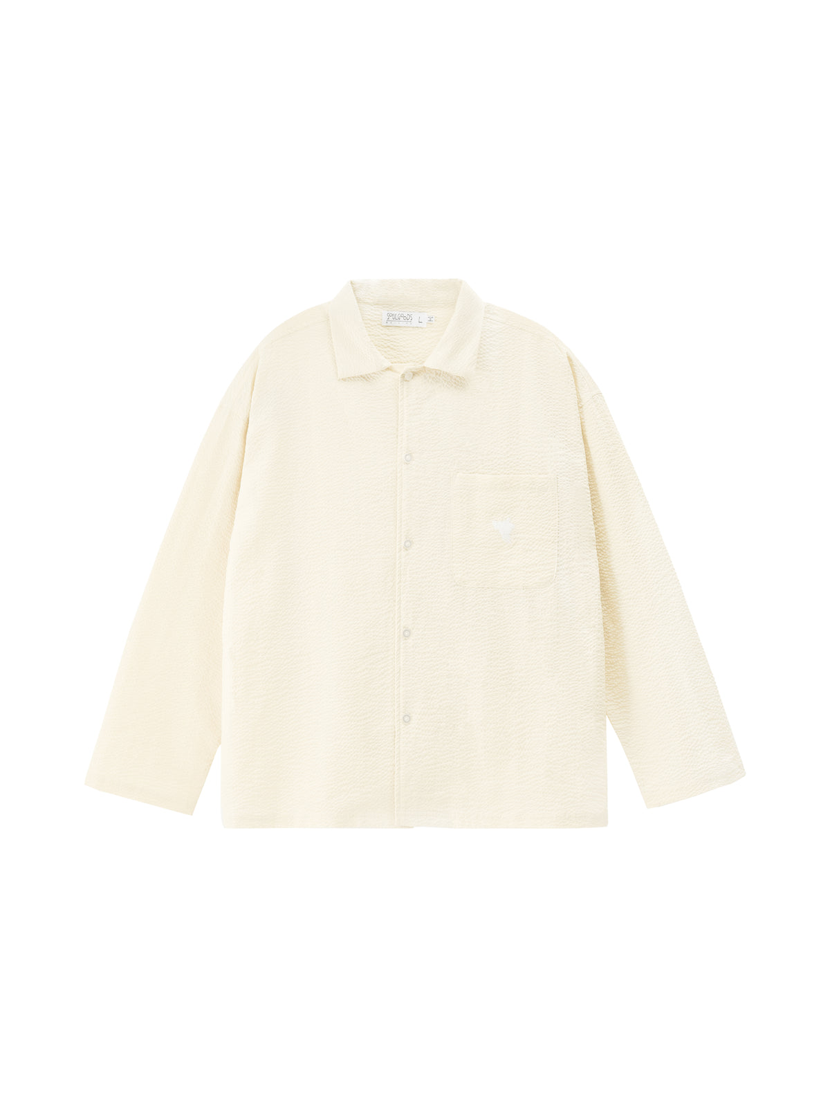 Cream-colored shirt on a white background