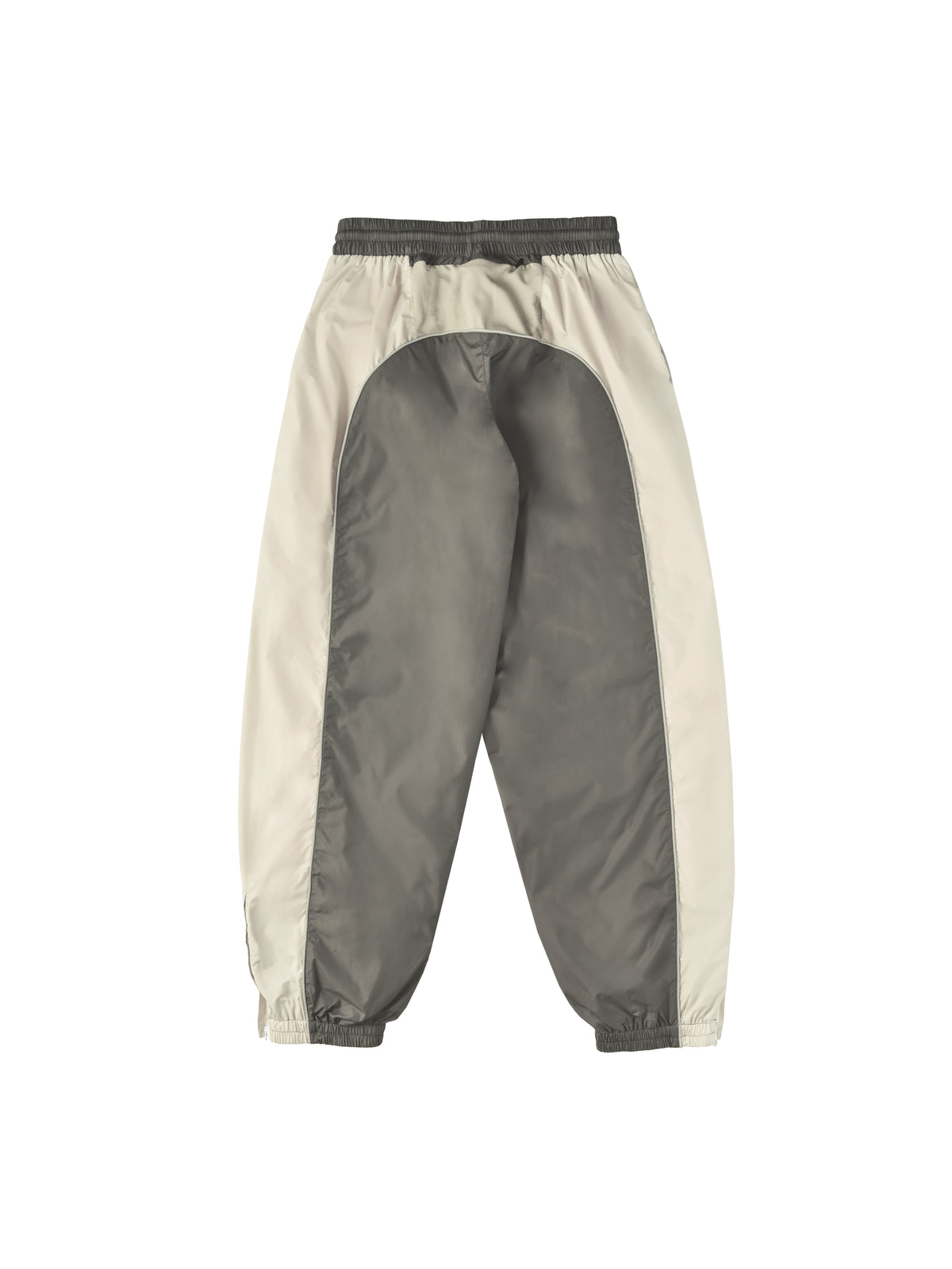 Two-tone pants with gray and beige sections on a white background