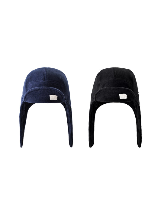 Two beanies, one navy and one black, on a white background