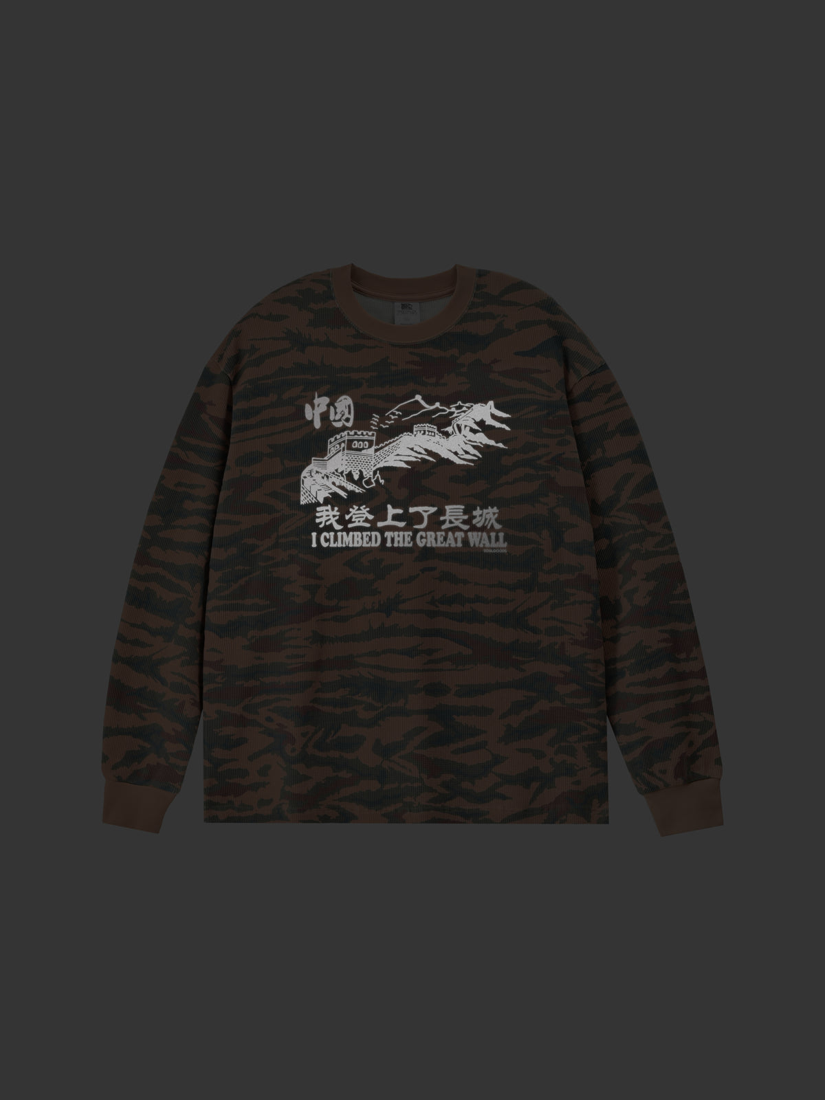 Camouflage long-sleeve shirt with the great wall graphic design and text on a black background
