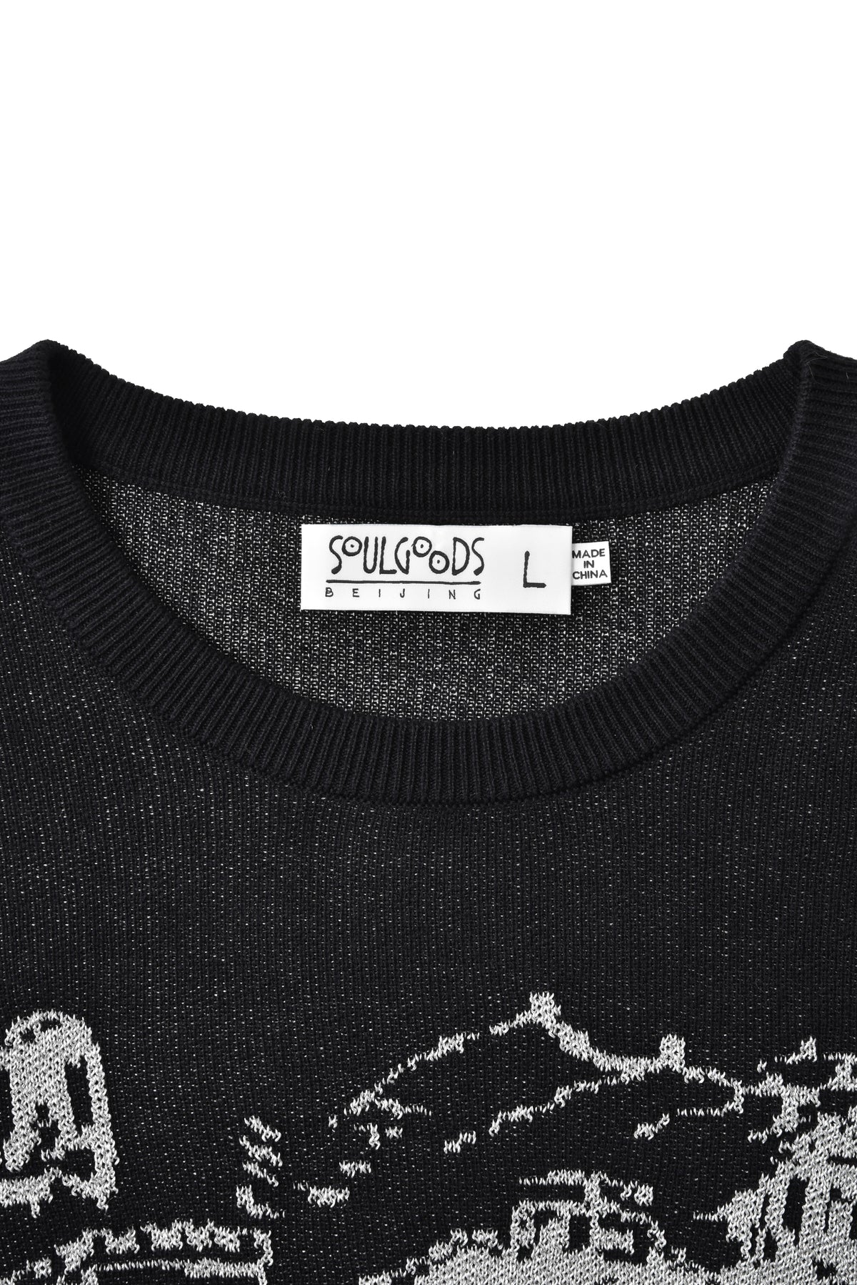 Black sweater with white The Great Wall design and 'Soulgoods' label on a white background