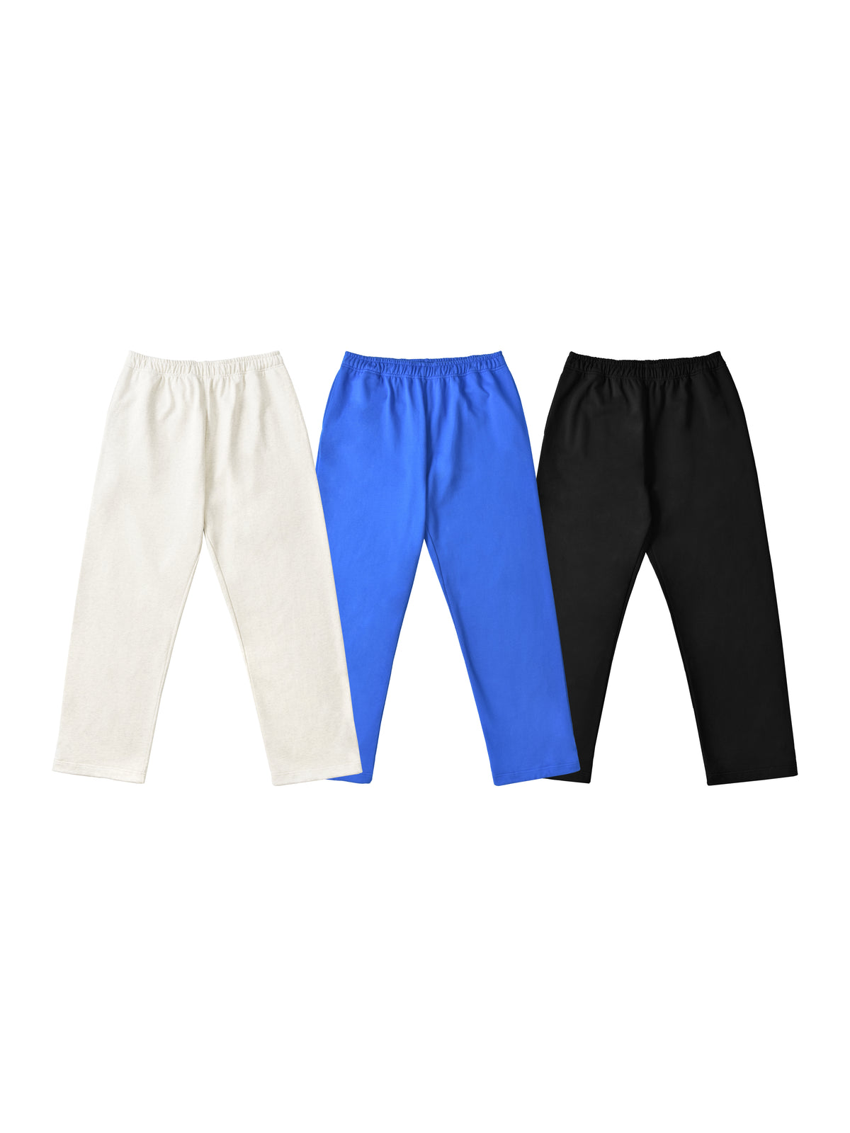 Three pairs of pants in white, blue, and black on a white background