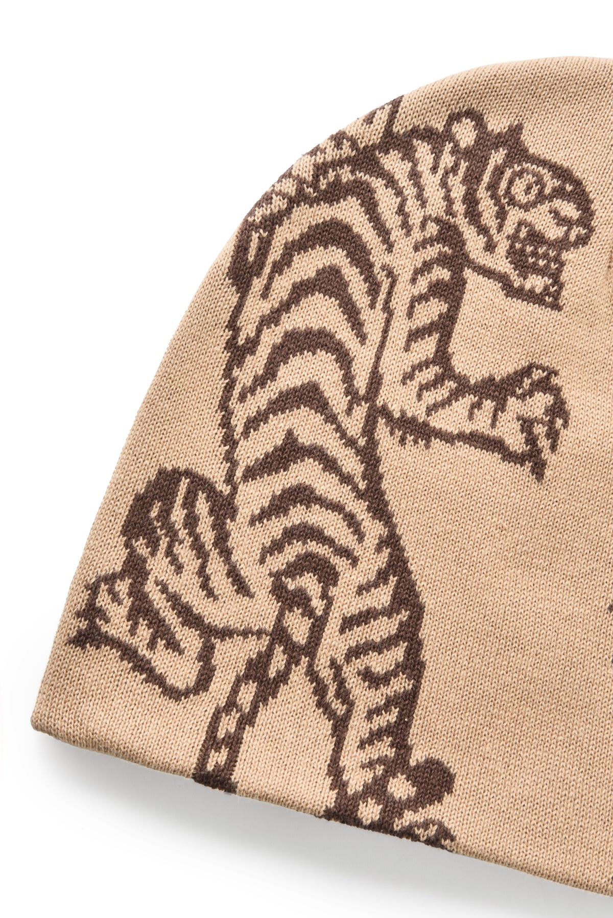 Beige fabric with brown tiger pattern on a white background
