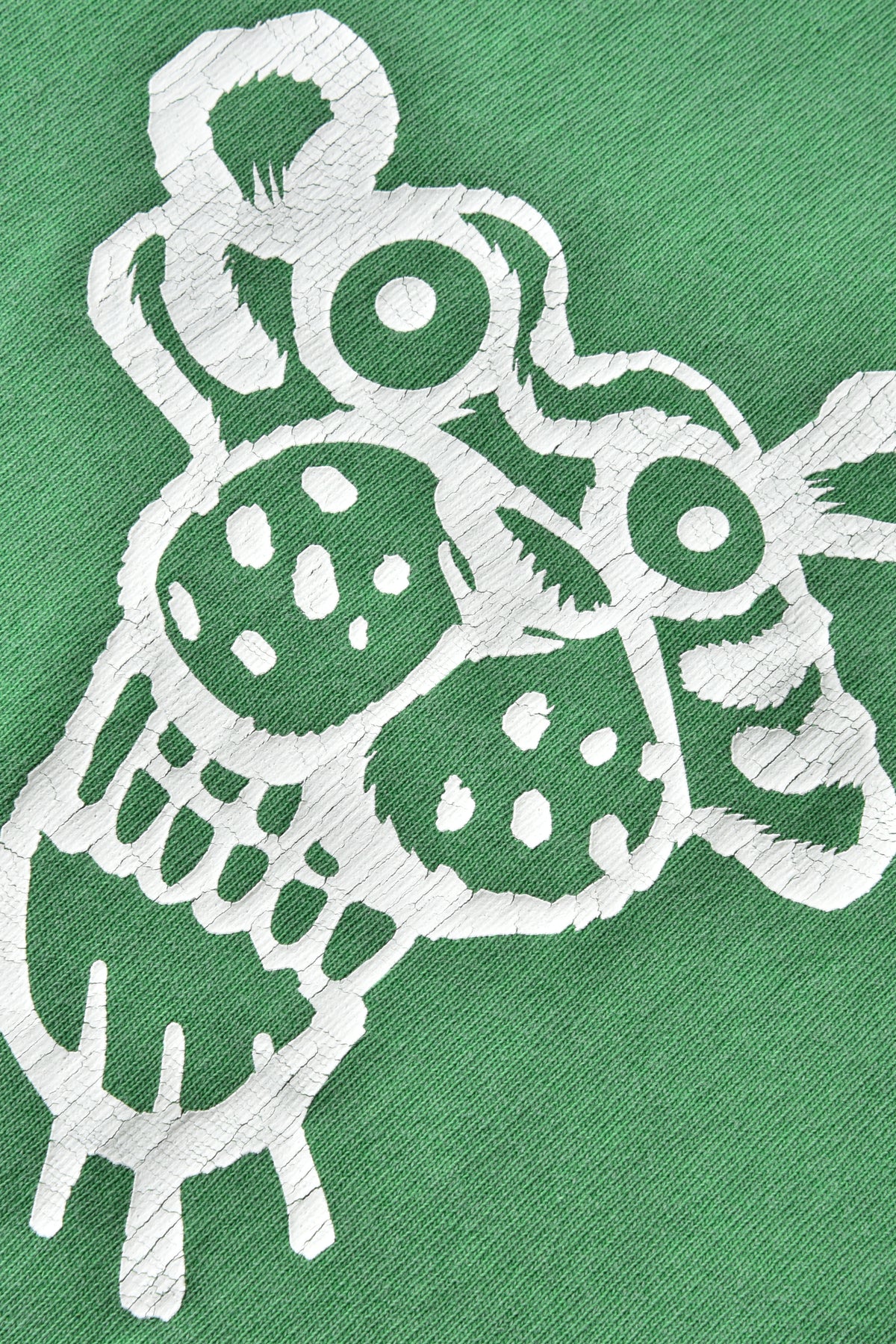 White soulgoods tiger print design on a green fabric background