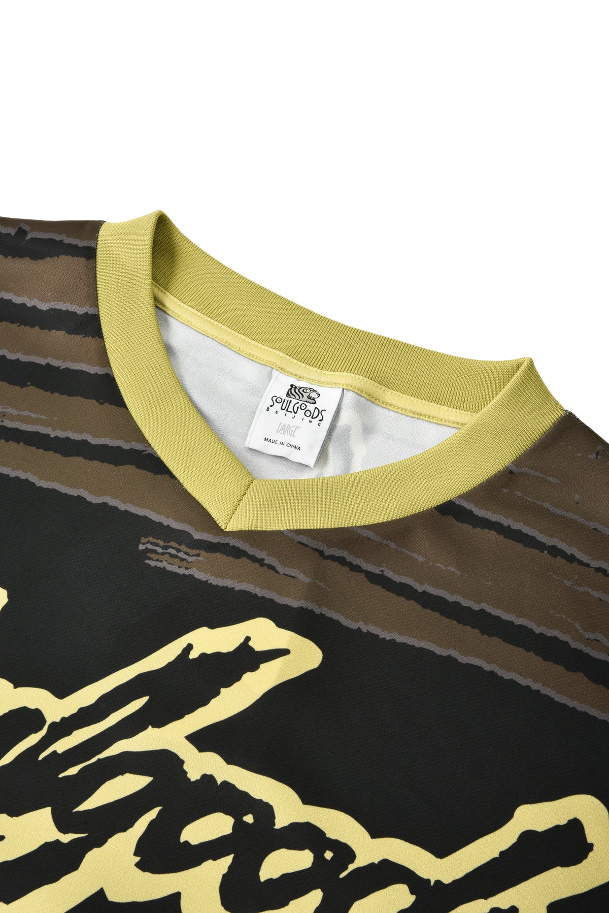 Close-up of a sports jersey with a brand tag on a white background