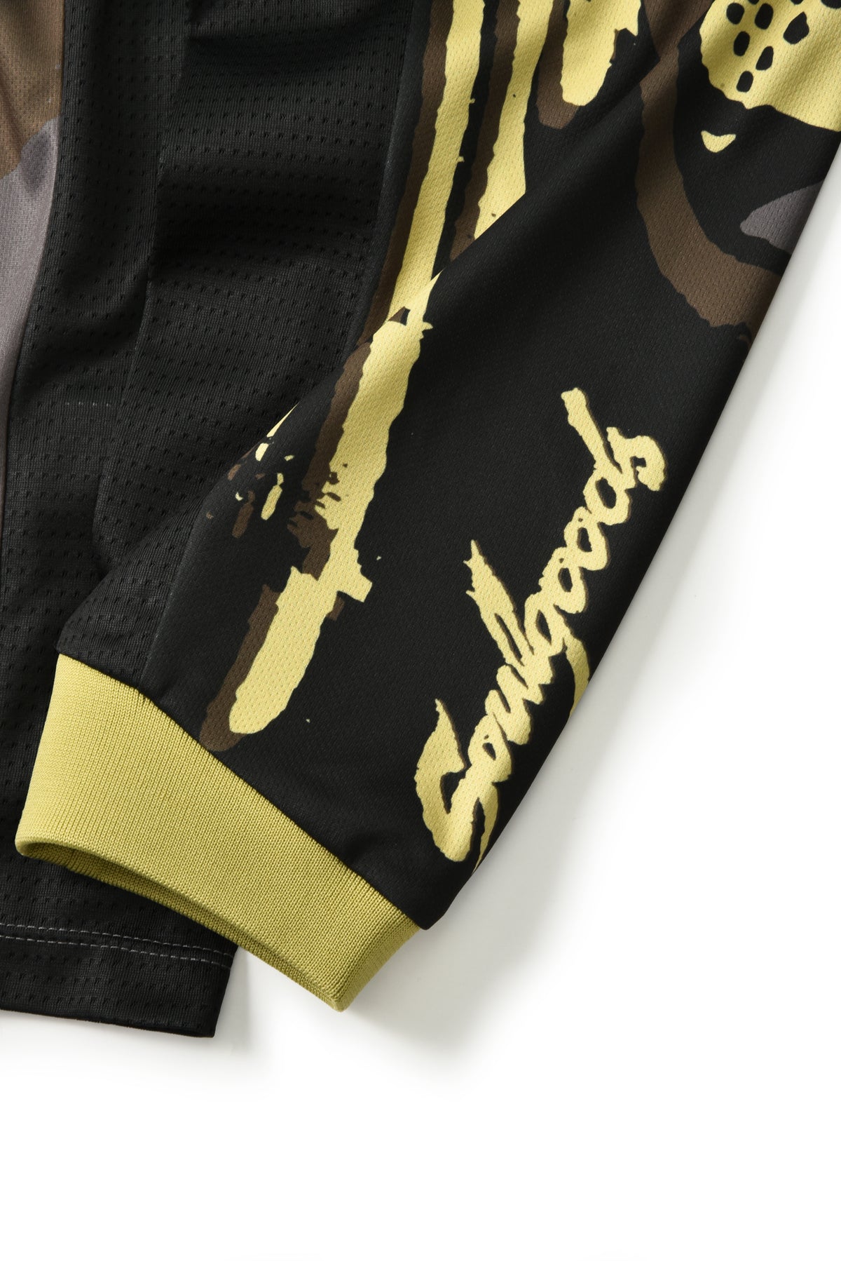 Black and gold sports jersey with 'Soulgoods' branding on a white background