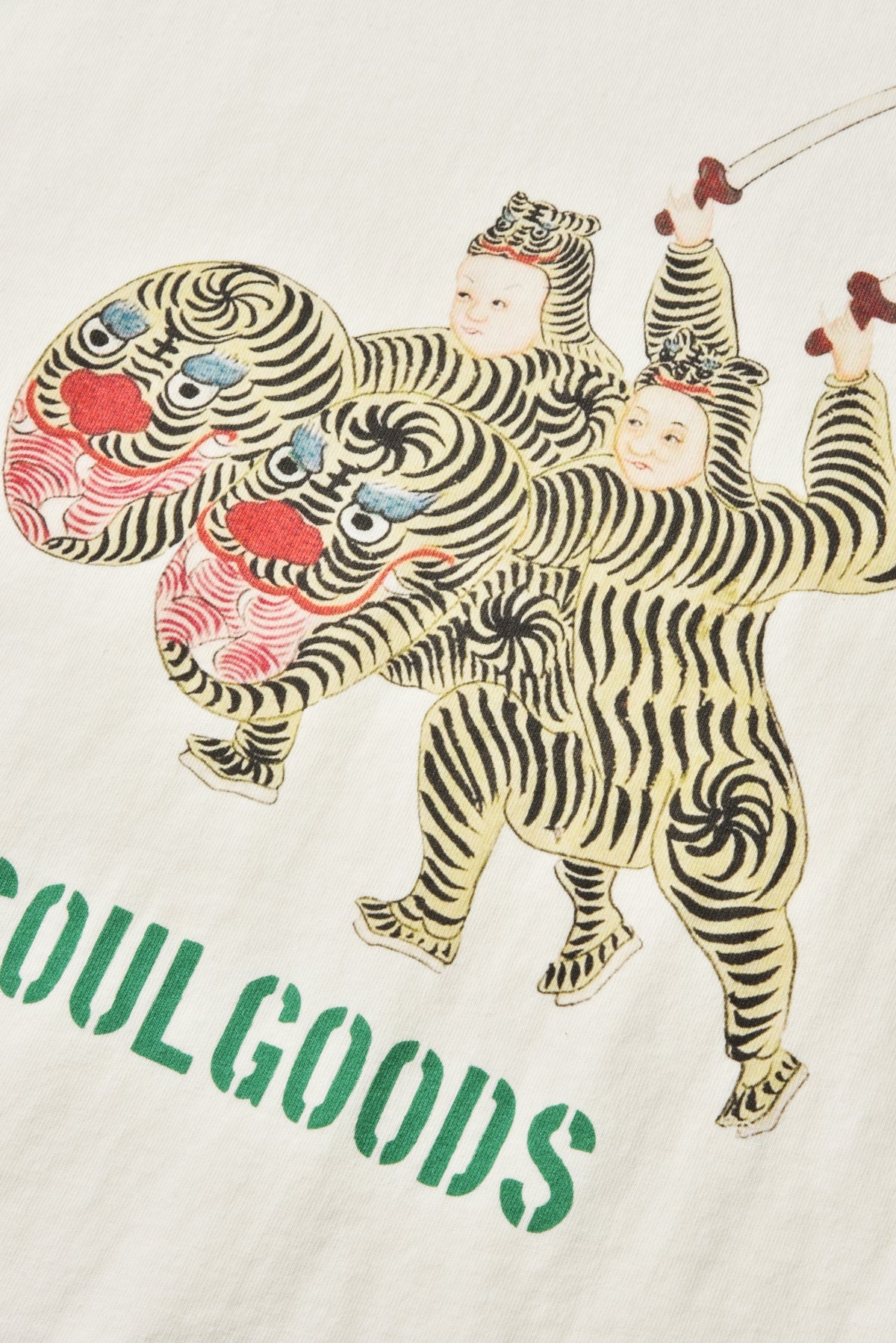 Illustration of a tiger-like creature with children riding it, featuring 'Soul Goods' branding.