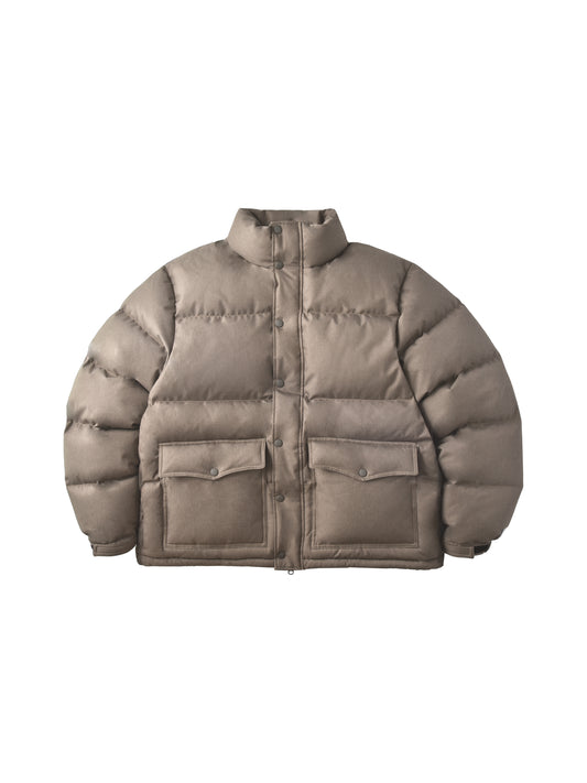 Beige puffer jacket on a white background